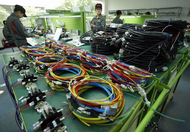 Wiring harness manufacturing team in the factory