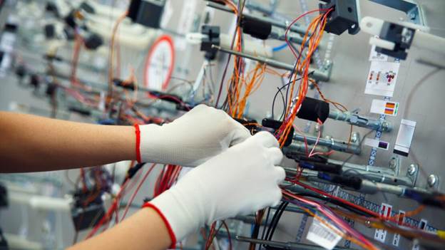 Wiring harness manufacturing team in the factory